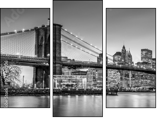 Brooklyn bridge and New York City Manhattan downtown skyline at dusk with skyscrapers illuminated over East River panorama. Panoramic composition. - Three-piece canvas, Triptych
