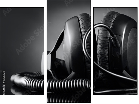 Modern headphones over dark background - Three-piece canvas, Triptych
