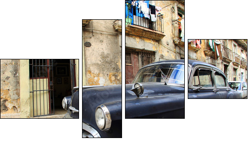 A classic old car is black color parked in front of the building - Four-piece canvas, Fortyk