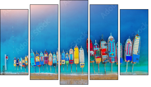 Aerial view of colorful boats in mediterranean sea in Oludeniz, Turkey. Beautiful summer landscape with ships, clear blue water and sandy beach at sunset. Top view of yachts from drone in Europe - Five-piece canvas, Pentaptych